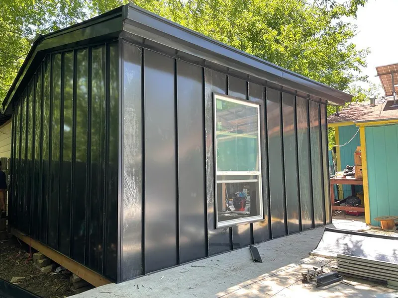 Black standing seam metal wall panels for Metal Roof Installation in Forestville