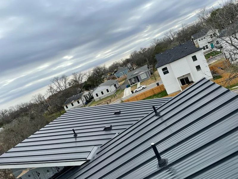 Standing seam metal roof panels with vents for Skylight Repair in Forestville